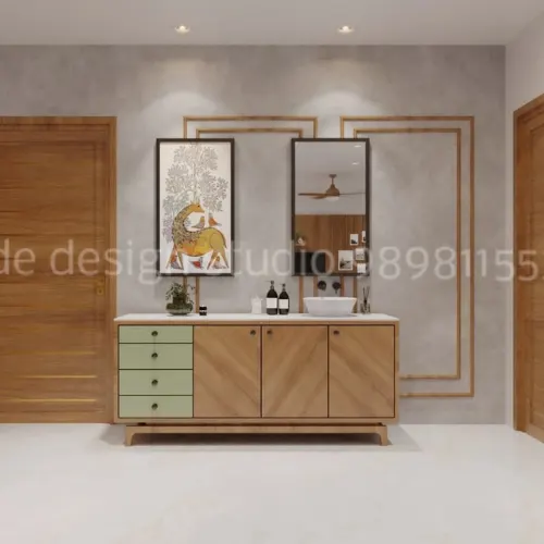 Traditional Kerala style interior with wooden vanity cabinet green drawers framed artwork decorative mirror and subtle wall detailing